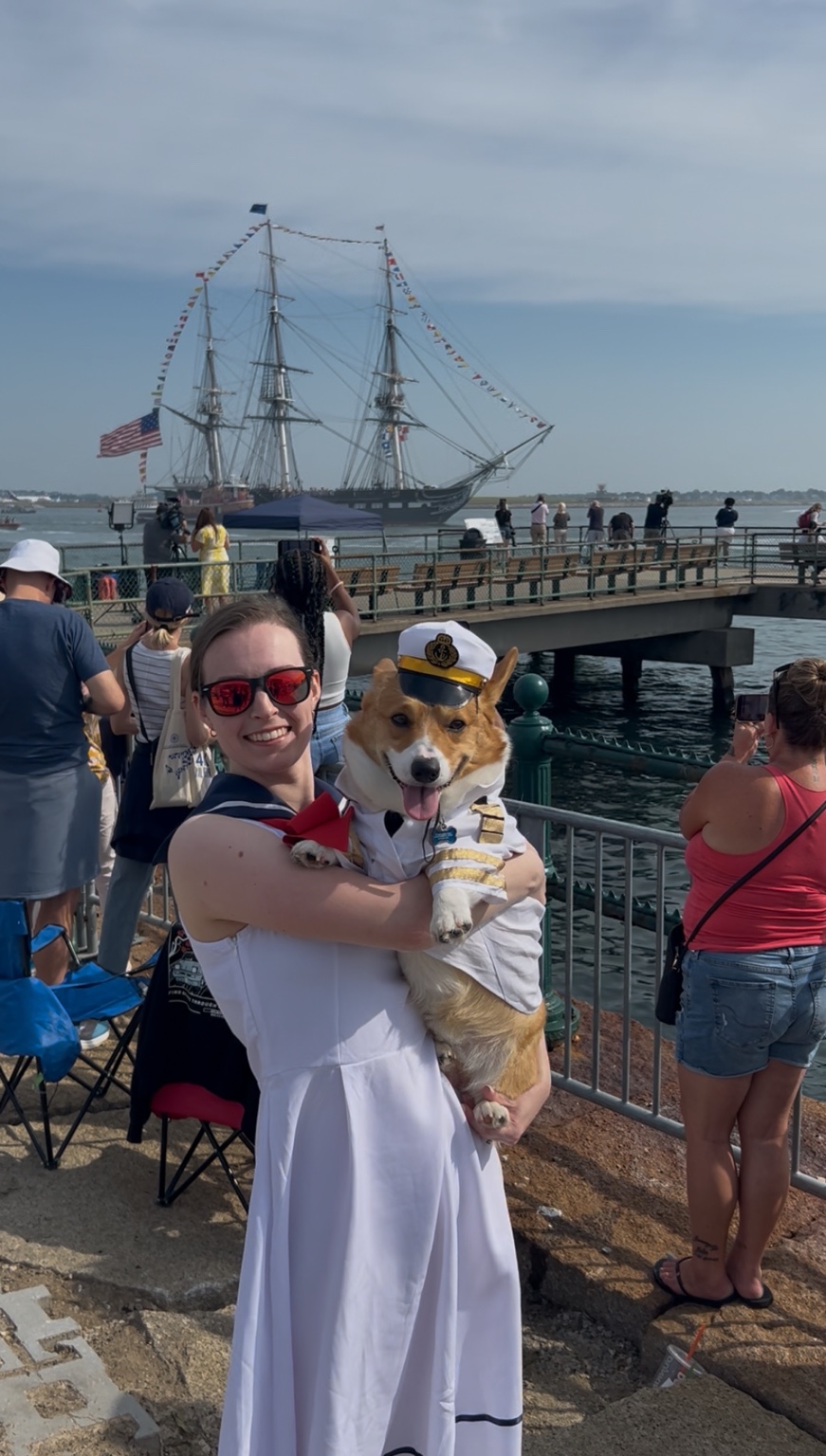 Rocko being held with a tall ship behind him